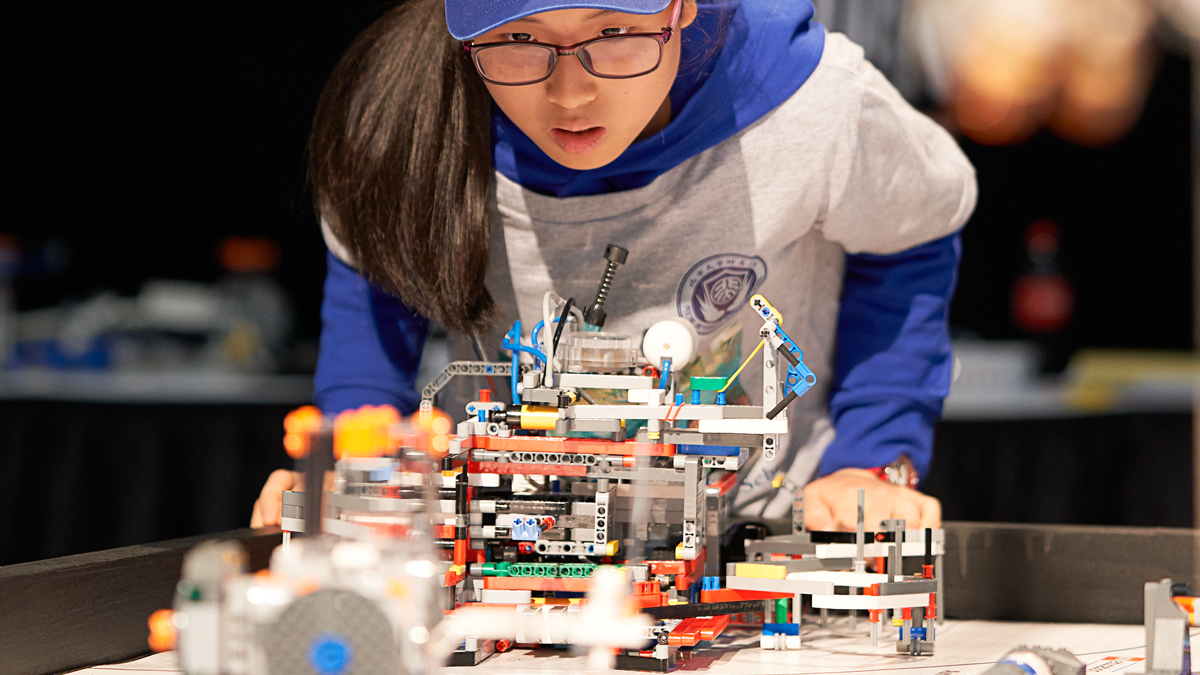High school student participates in STEM competition with a LEGO MINDSTORMS Education EV3 Robot